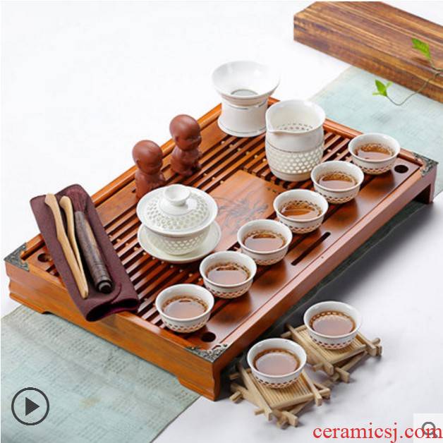A complete set of ceramic tea set household kung fu tea cup solid wood tea tray tea tea accessories tea bag sea mail