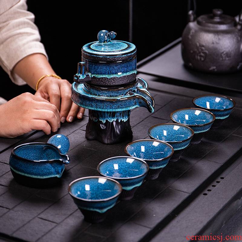 Ya xin $# up tea set home lazy semi - automatic creative stone mill kung fu tea, building ceramic lamp