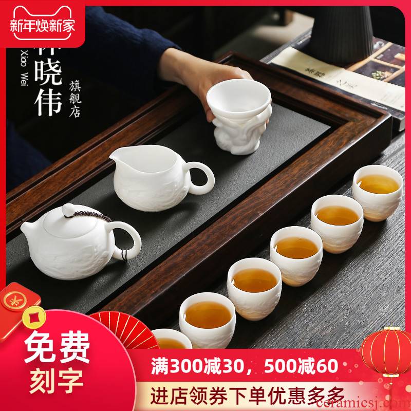 Dehua suet jade biscuit firing manual white porcelain kung fu tea set suit household ceramic teapot of a complete set of tea cups