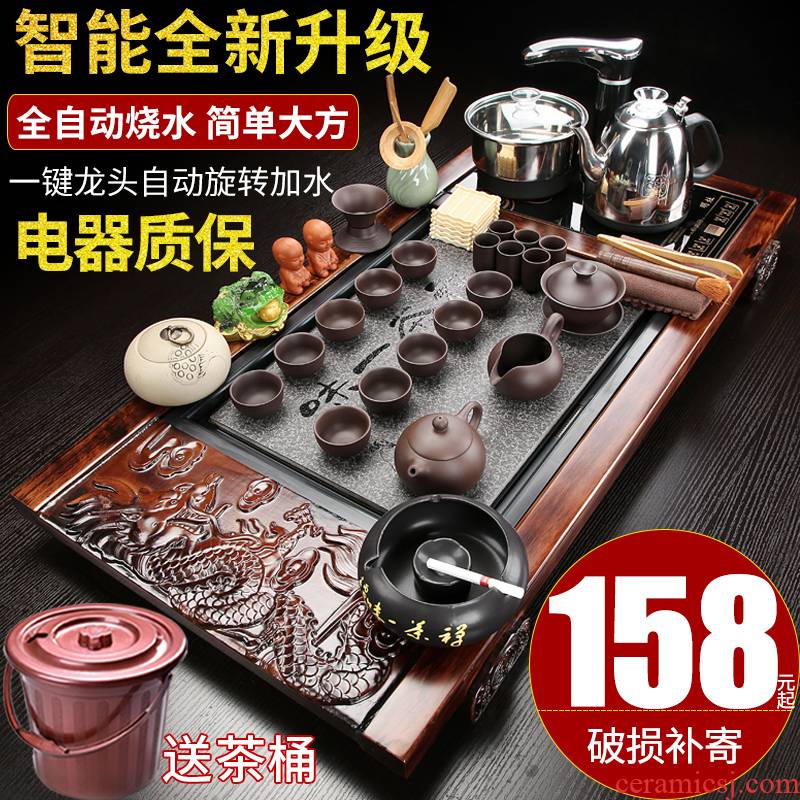 Hui shi violet arenaceous kung fu tea set home sitting room is contracted ceramic tea cups of tea a automatic solid wood tea tray