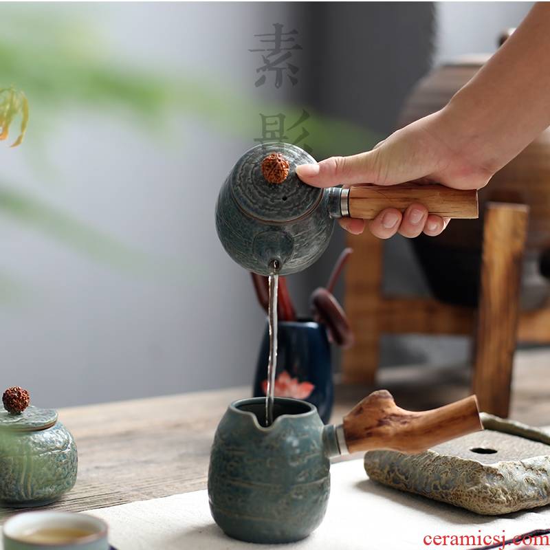Qiao mu household ceramics filter archaize kung fu tea tea teapot Japanese side of real wood as the office