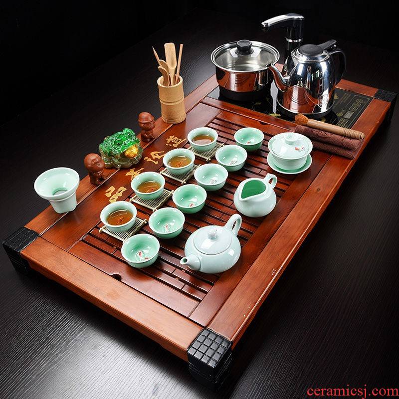 The hutch of a complete set of solid wood tea tray package ceramic kung fu tea tea set household contracted with integrated electric magnetic mixture furnace