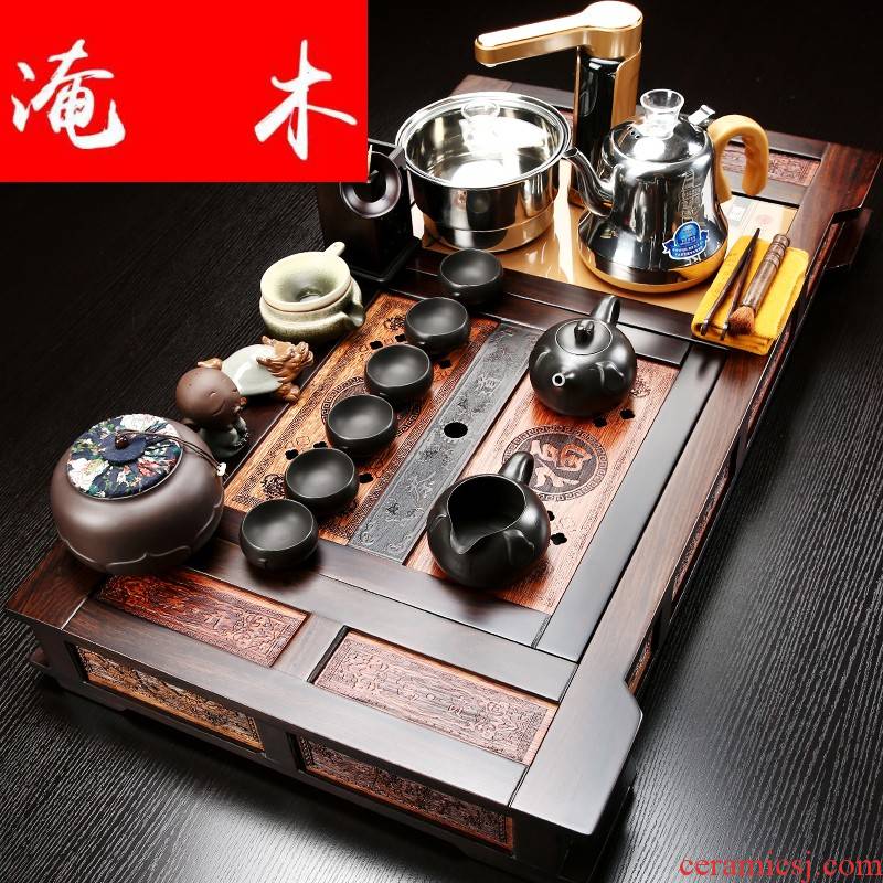 Flooded ebony wood tea tray was violet arenaceous kung fu tea set four unity of a complete set of automatic induction cooker household tea set