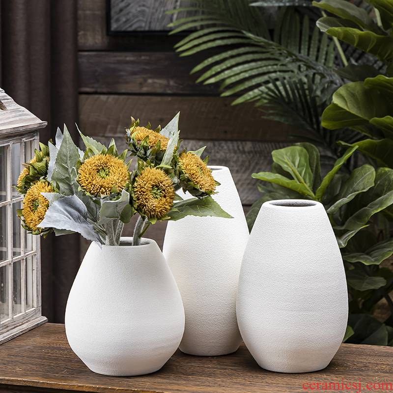 White ceramic vases, dried flowers, flower arrangement contracted creative water raise modern Scandinavian living room table household adornment furnishing articles