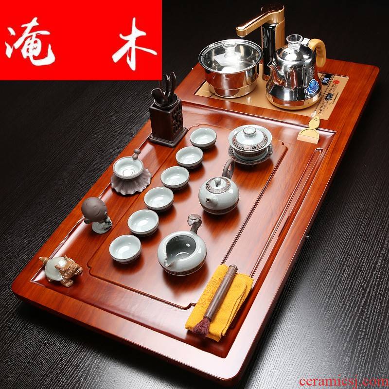Submerged wood blocks hua limu tea tray and four automatic induction cooker purple ceramic kung fu tea set