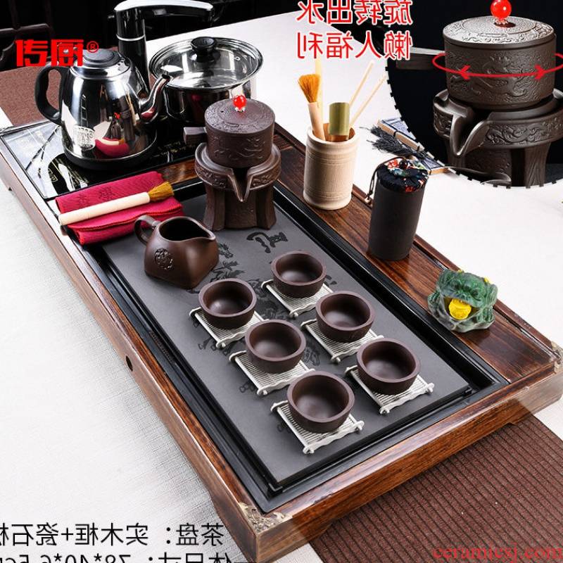 The kitchen kung fu tea set home a whole set of high - grade automatic solid wood tea tray zisha teapot teacup tao