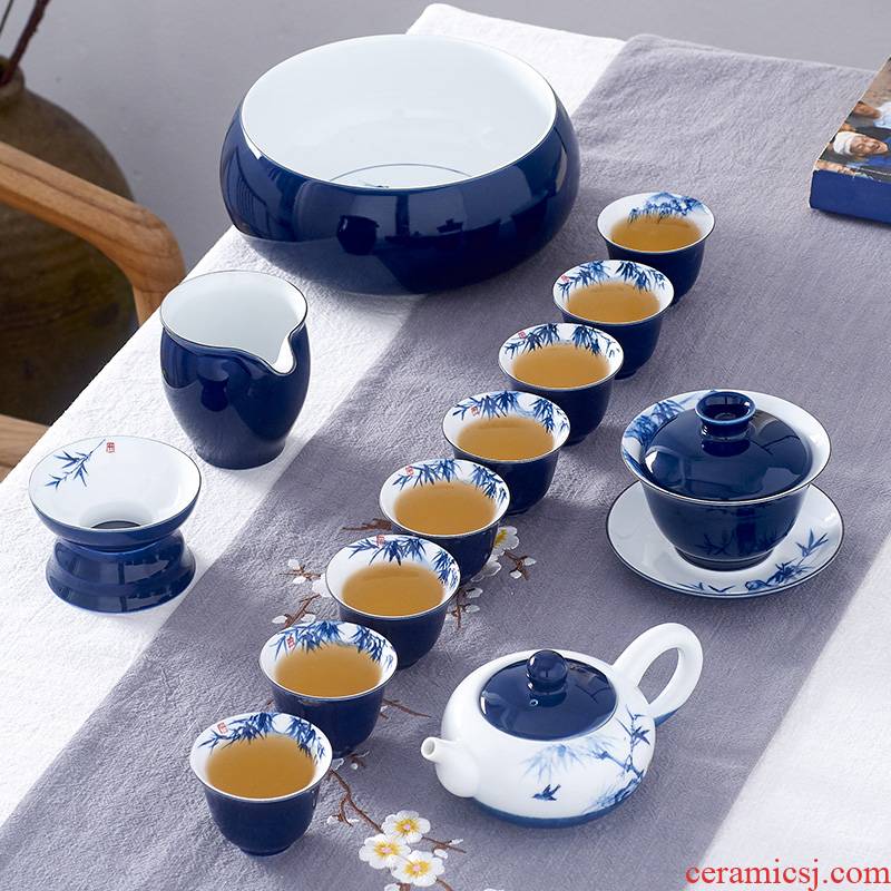 Kung fu tea set suit household under the glaze hand - made teacup tureen ceramic teapot a complete set of living room office high - end of bamboo
